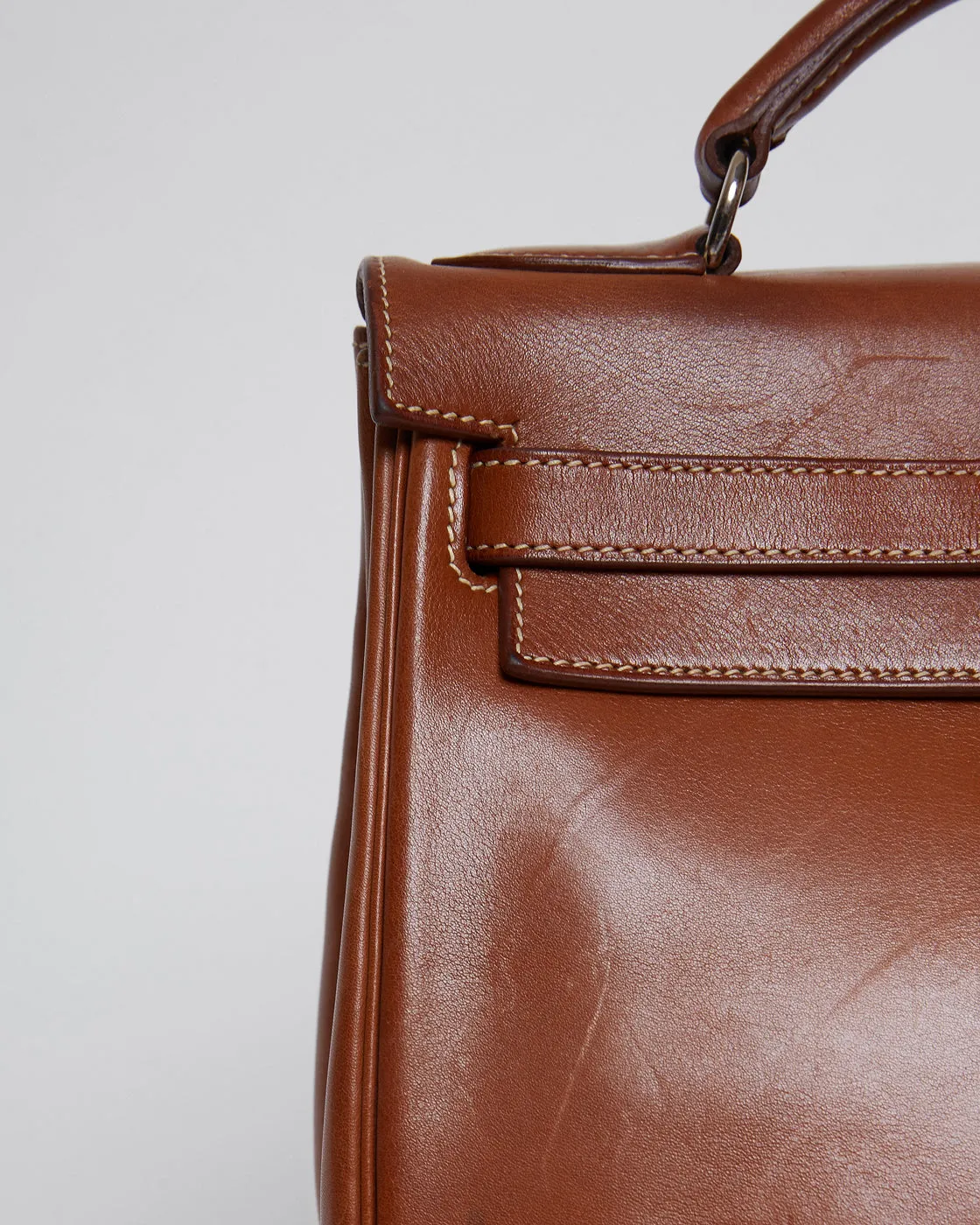 VINTAGE HERMÈS KELLY ADO BACKPACK in saddle brown leather