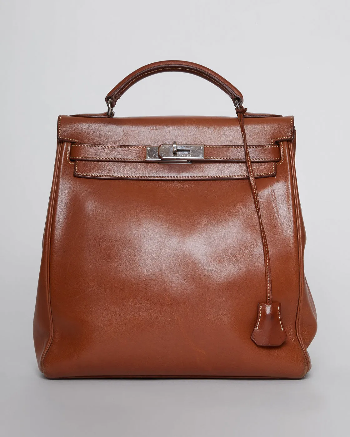 VINTAGE HERMÈS KELLY ADO BACKPACK in saddle brown leather