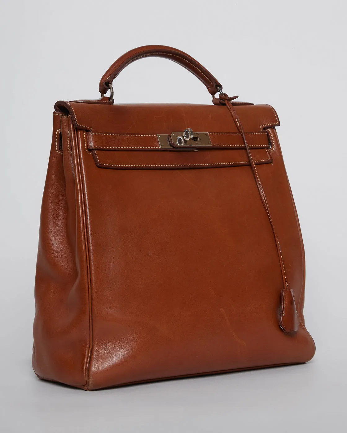 VINTAGE HERMÈS KELLY ADO BACKPACK in saddle brown leather